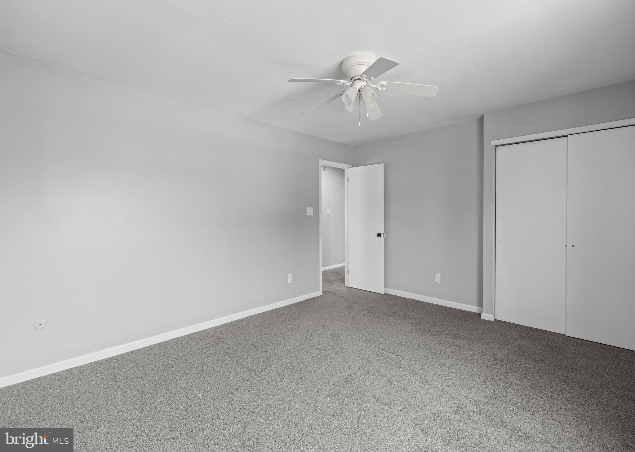 6 Heron Place Clementon, NJ 08021 - Photo 23 of 29 a view of an empty room and chandelier fan