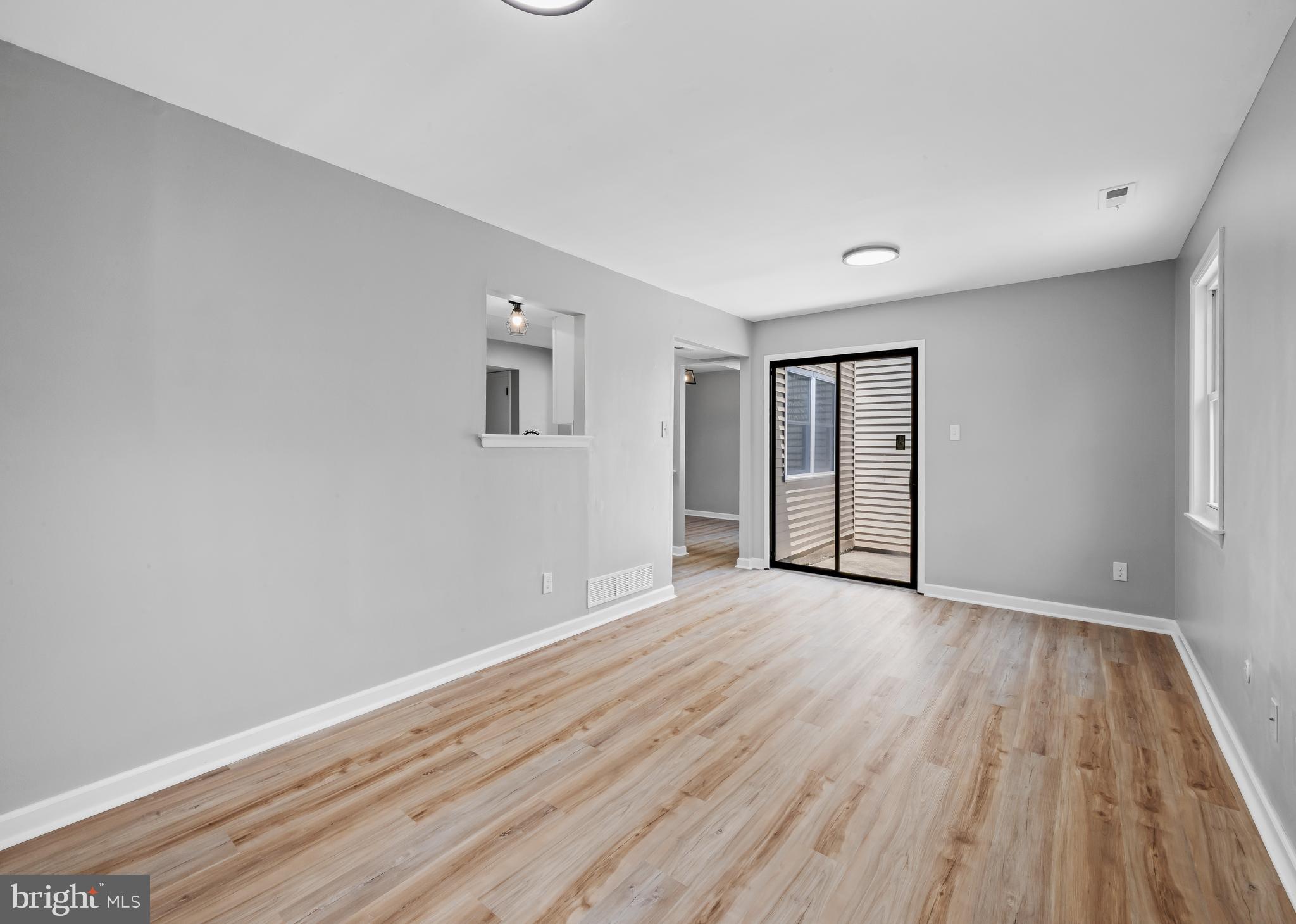 6 Heron Place Clementon, NJ 08021 - Photo 26 of 29 wooden floor in an empty room with a window
