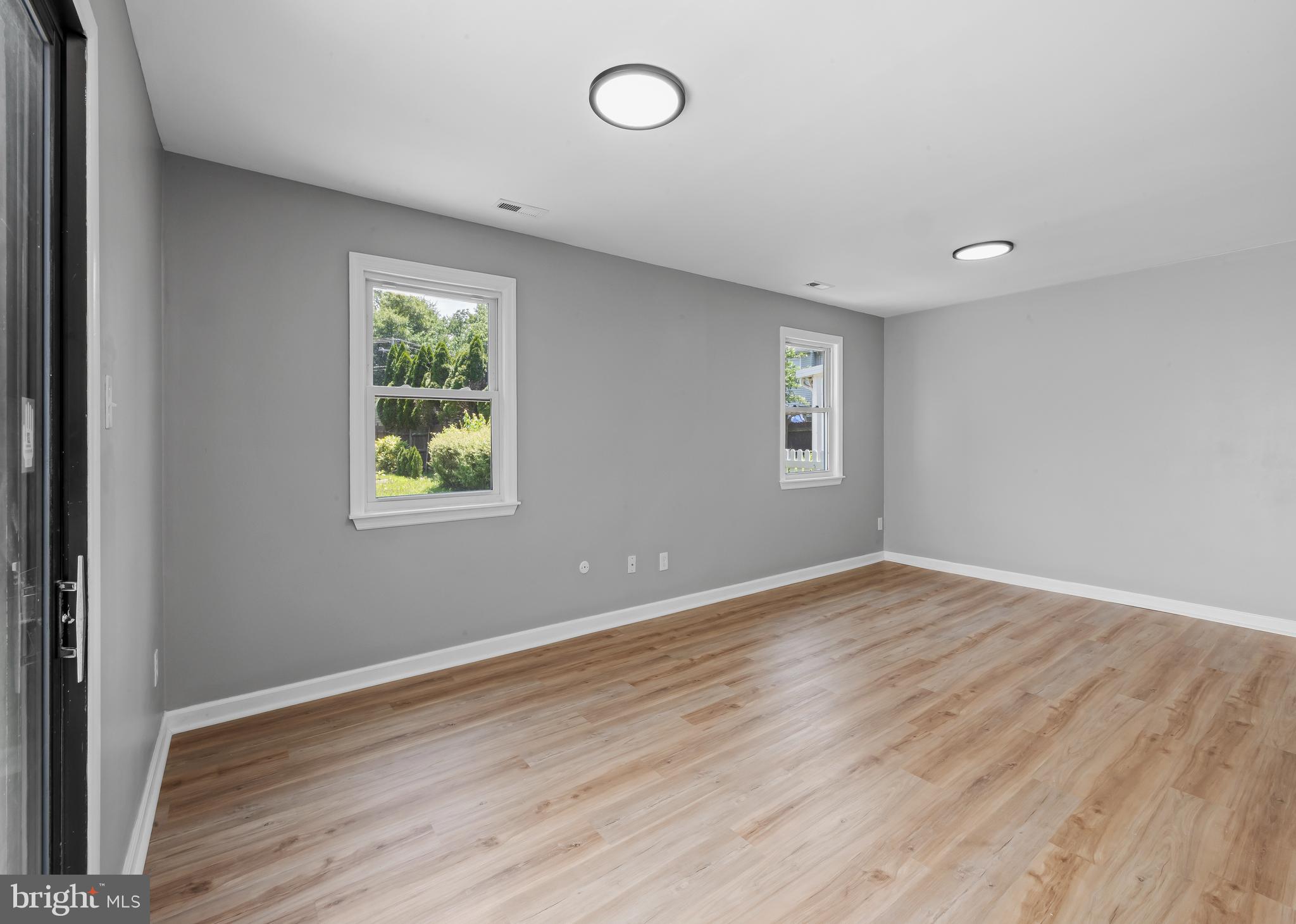 6 Heron Place Clementon, NJ 08021 - Photo 28 of 29 an empty room with wooden floor and windows