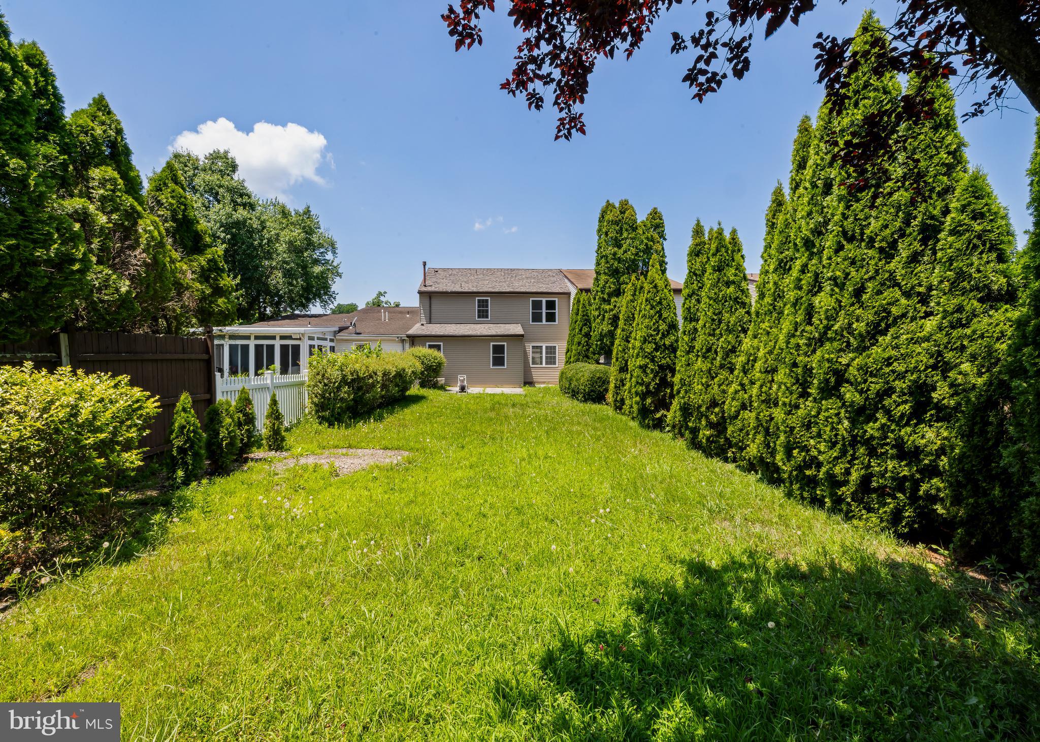 6 Heron Place Clementon, NJ 08021 - Photo 3 of 29 a view of a house with a yard and potted plants