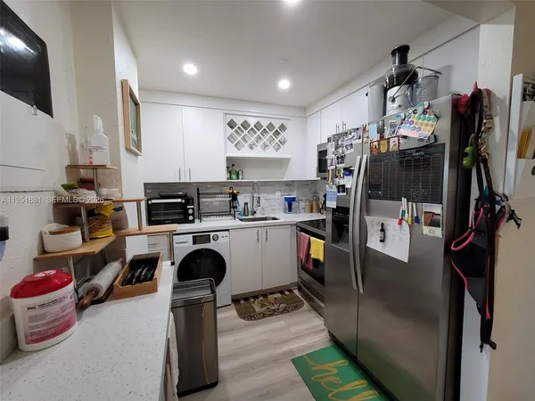 a view of entryway and workspace