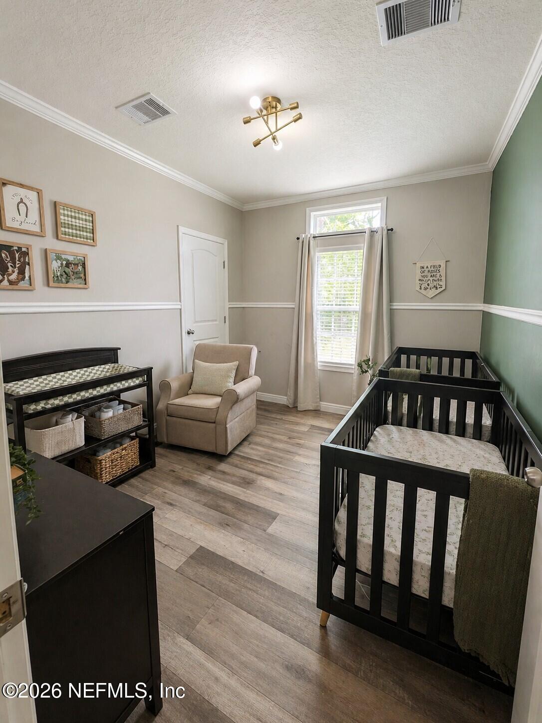 124 Jack Road Palatka, FL 32177 - Photo 11 of 18 a bedroom with furniture and a window