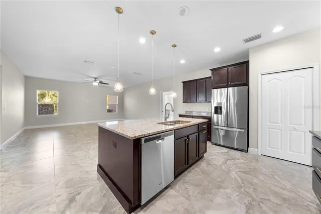 a view of a hallway with wooden shelves