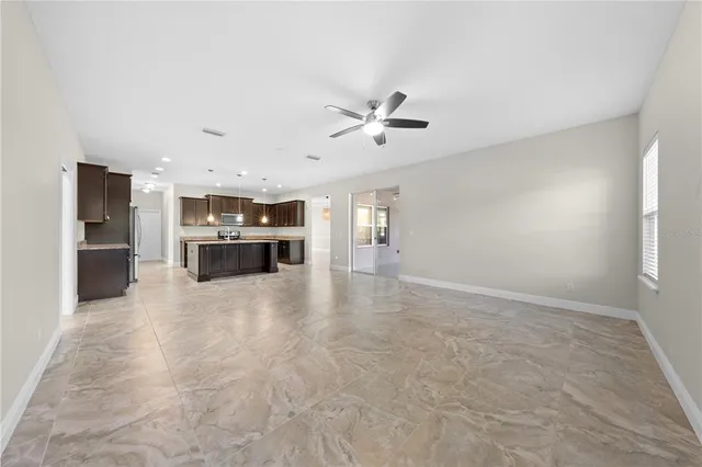 a bathroom with a toilet and bathtub