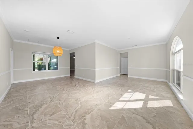 an empty room with windows