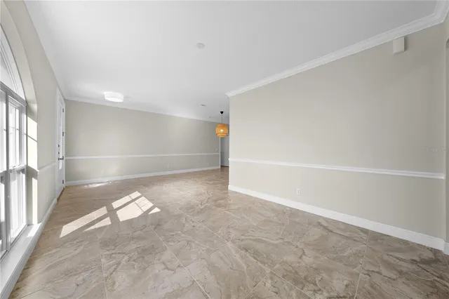 a view of kitchen with stainless steel appliances granite countertop a refrigerator a sink a stove and oven