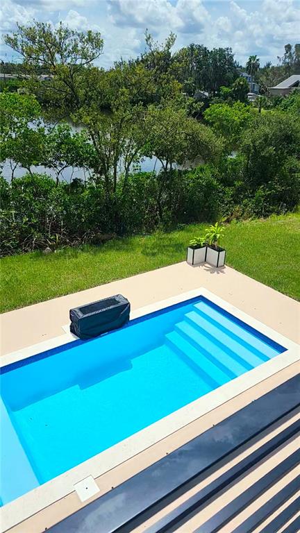 7609 Deedra Circle Port Richey, FL 34668 - Photo 15 of 63 a view of sitting area with wooden fence