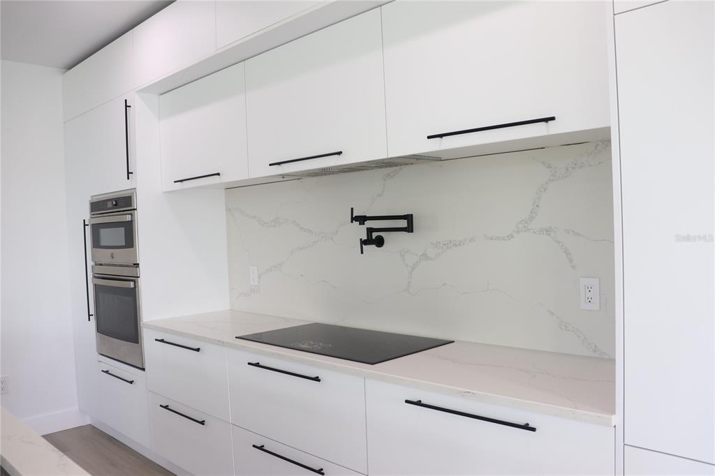 7609 Deedra Circle Port Richey, FL 34668 - Photo 23 of 63 a utility room with dryer and washer