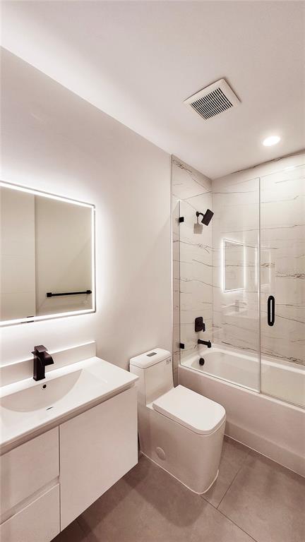 7609 Deedra Circle Port Richey, FL 34668 - Photo 46 of 63 a bathroom with a bathtub shower sink and toilet