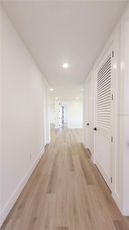 7609 Deedra Circle Port Richey, FL 34668 - Photo 47 of 63 a view of empty room with wooden floor