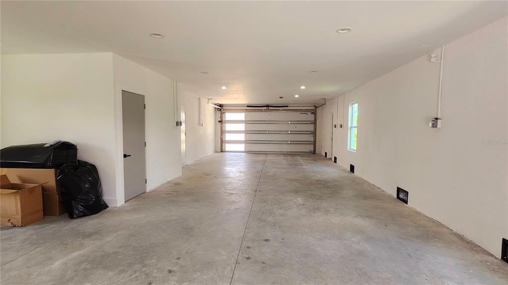 7609 Deedra Circle Port Richey, FL 34668 - Photo 53 of 63 a view of empty room with wooden floor