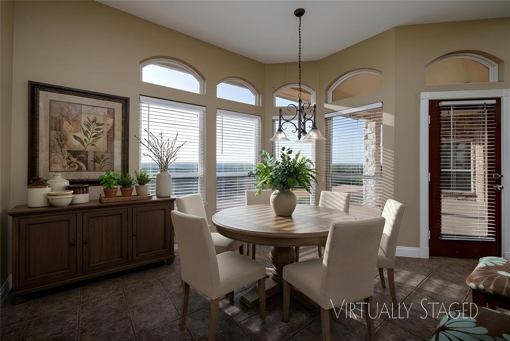 270 Stone Mountain Road Cresson, TX 76035 - Photo 11 of 40 a view of a dining room with furniture window and outside view