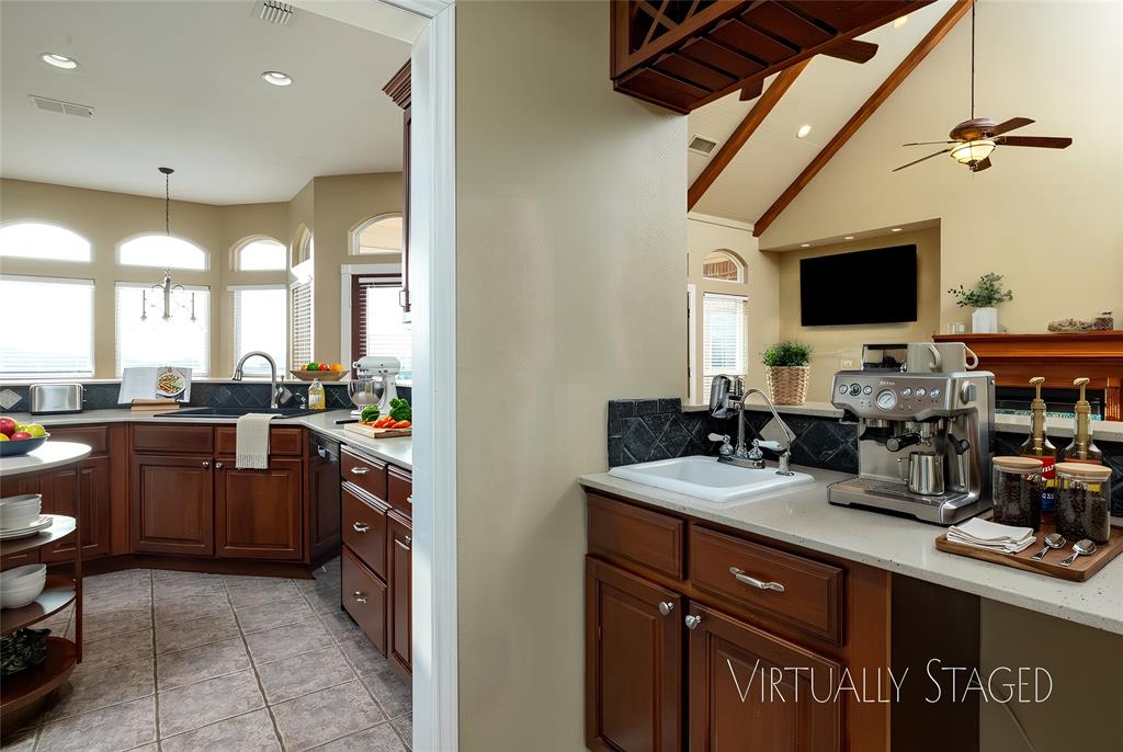 270 Stone Mountain Road Cresson, TX 76035 - Photo 15 of 40 a kitchen with sink and refrigerator