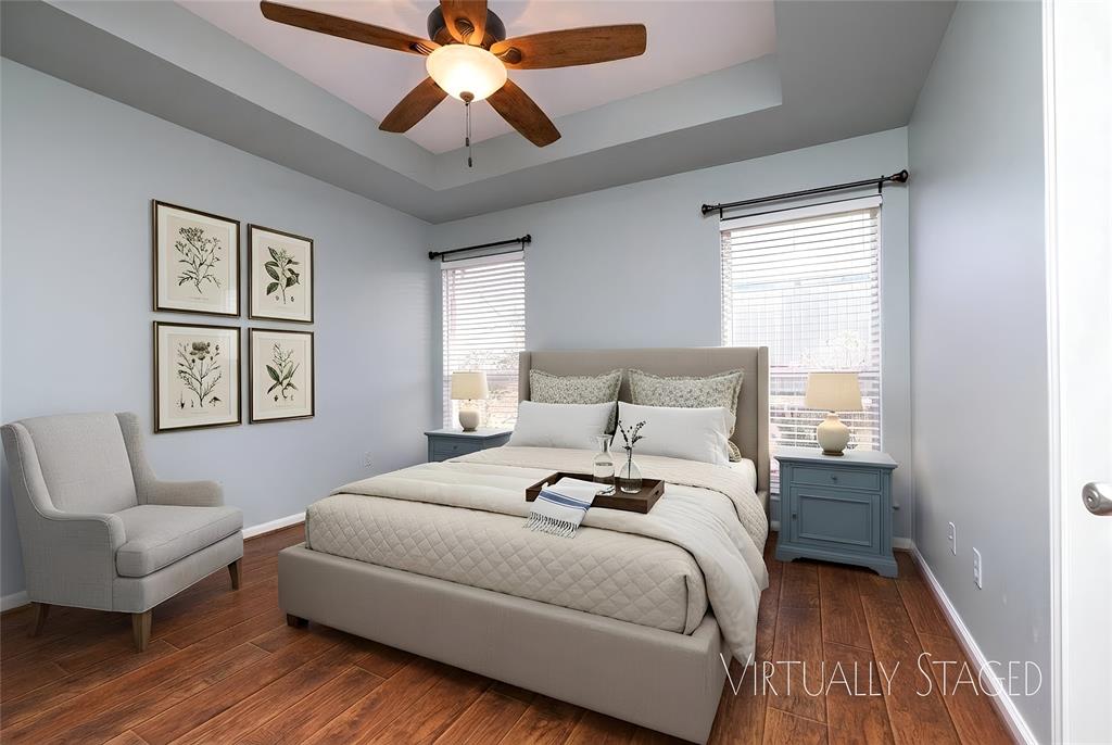 270 Stone Mountain Road Cresson, TX 76035 - Photo 24 of 40 a bedroom with a bed and wooden floor