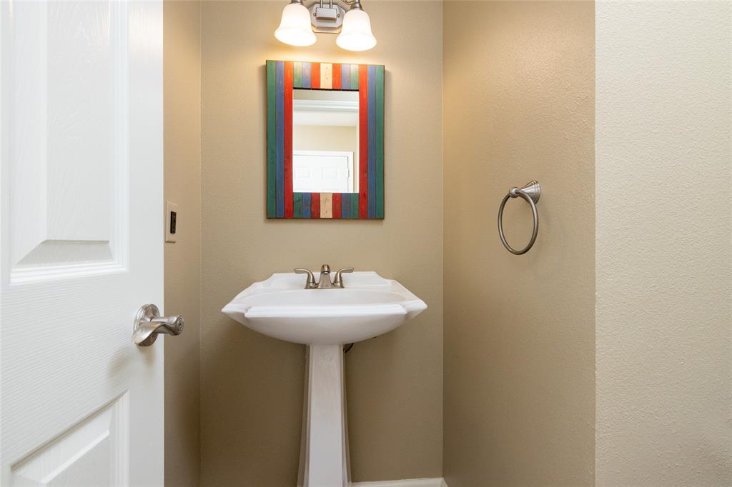 270 Stone Mountain Road Cresson, TX 76035 - Photo 28 of 40 a bathroom with a sink toilet and mirror