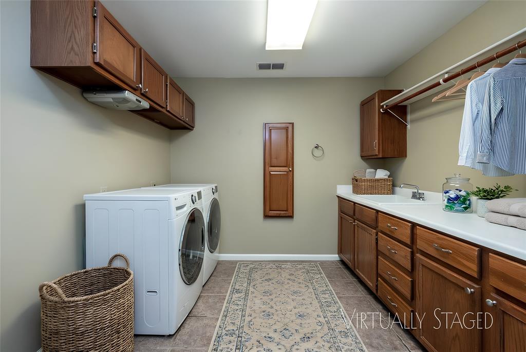 270 Stone Mountain Road Cresson, TX 76035 - Photo 29 of 40 a utility room with sink dryer and washer