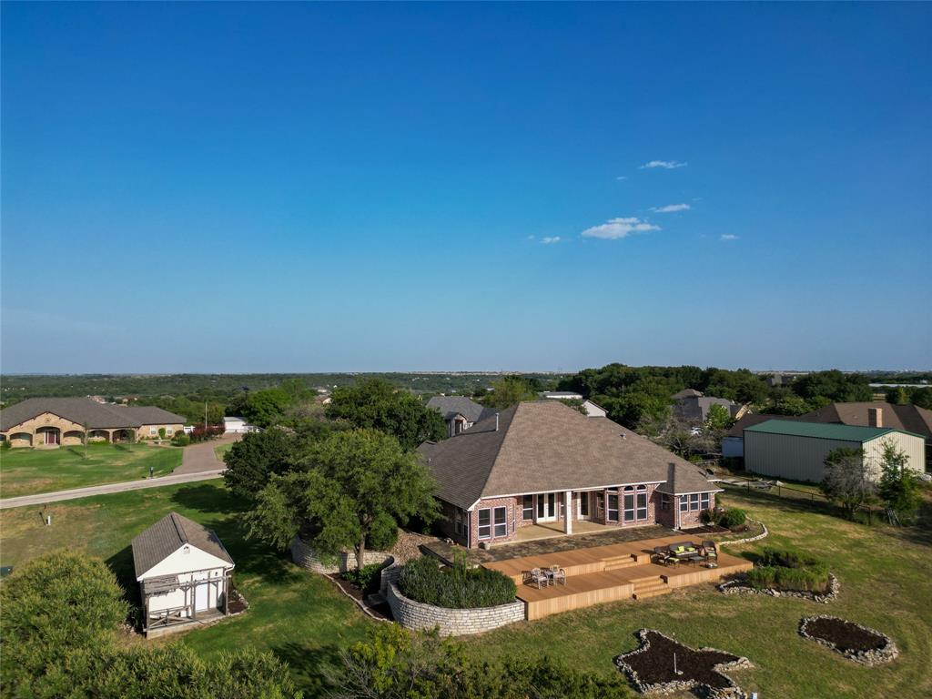 270 Stone Mountain Road Cresson, TX 76035 - Photo 32 of 40 an aerial view of a house with a garden