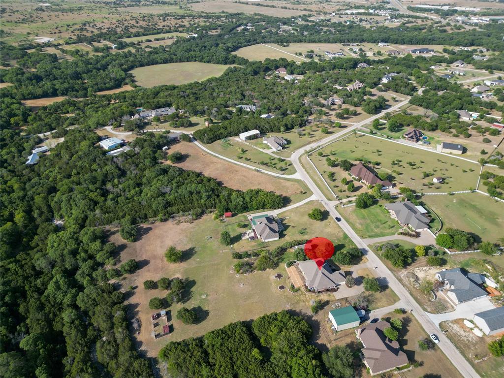 270 Stone Mountain Road Cresson, TX 76035 - Photo 36 of 40 an aerial view of residential houses with outdoor space