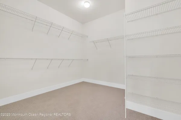 a view of a room with racks on the wall