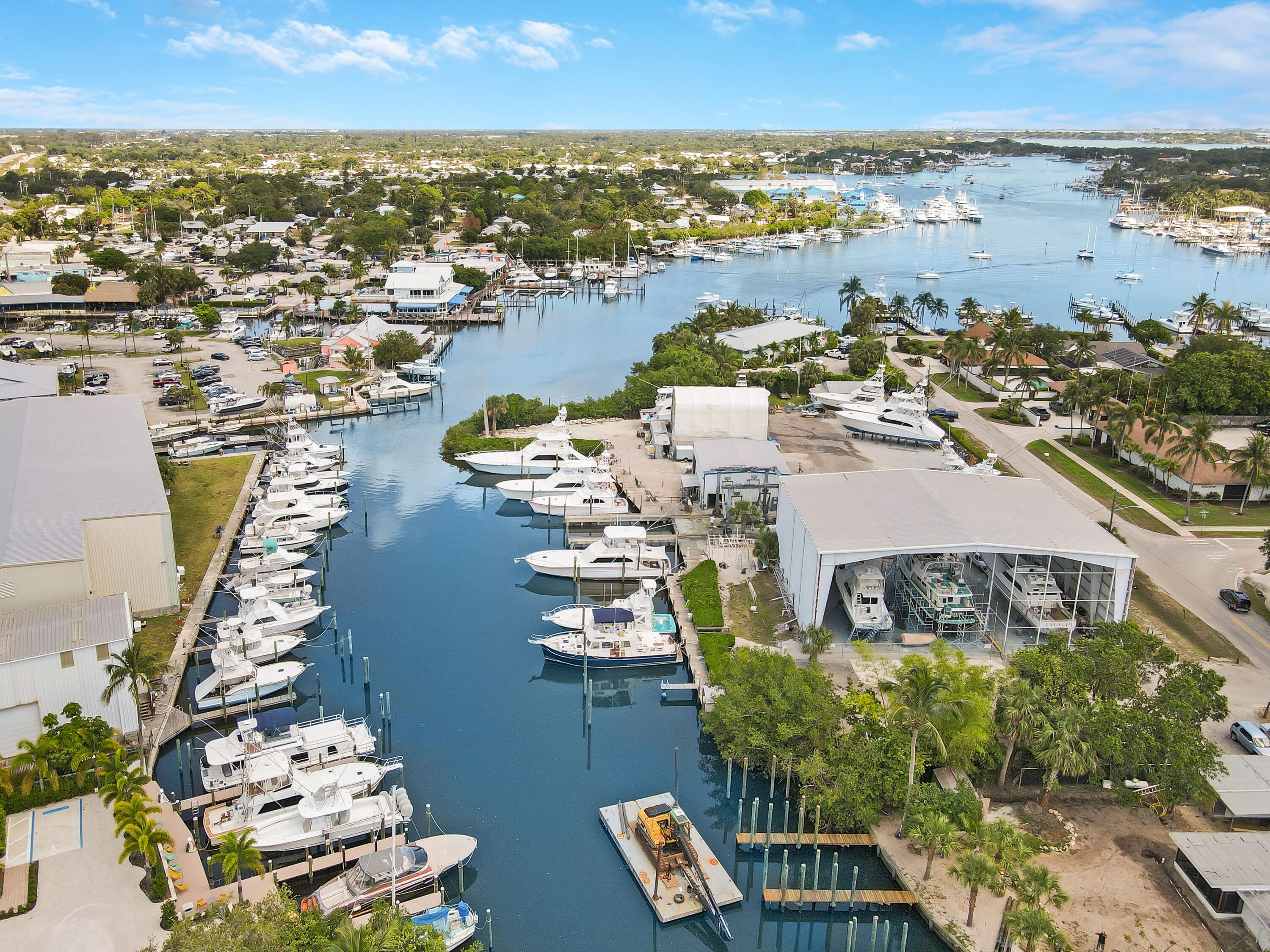 4982 Southeast Railway Avenue Stuart, FL 34997 - Photo 18 of 36 an aerial view of ocean and residential houses with outdoor space