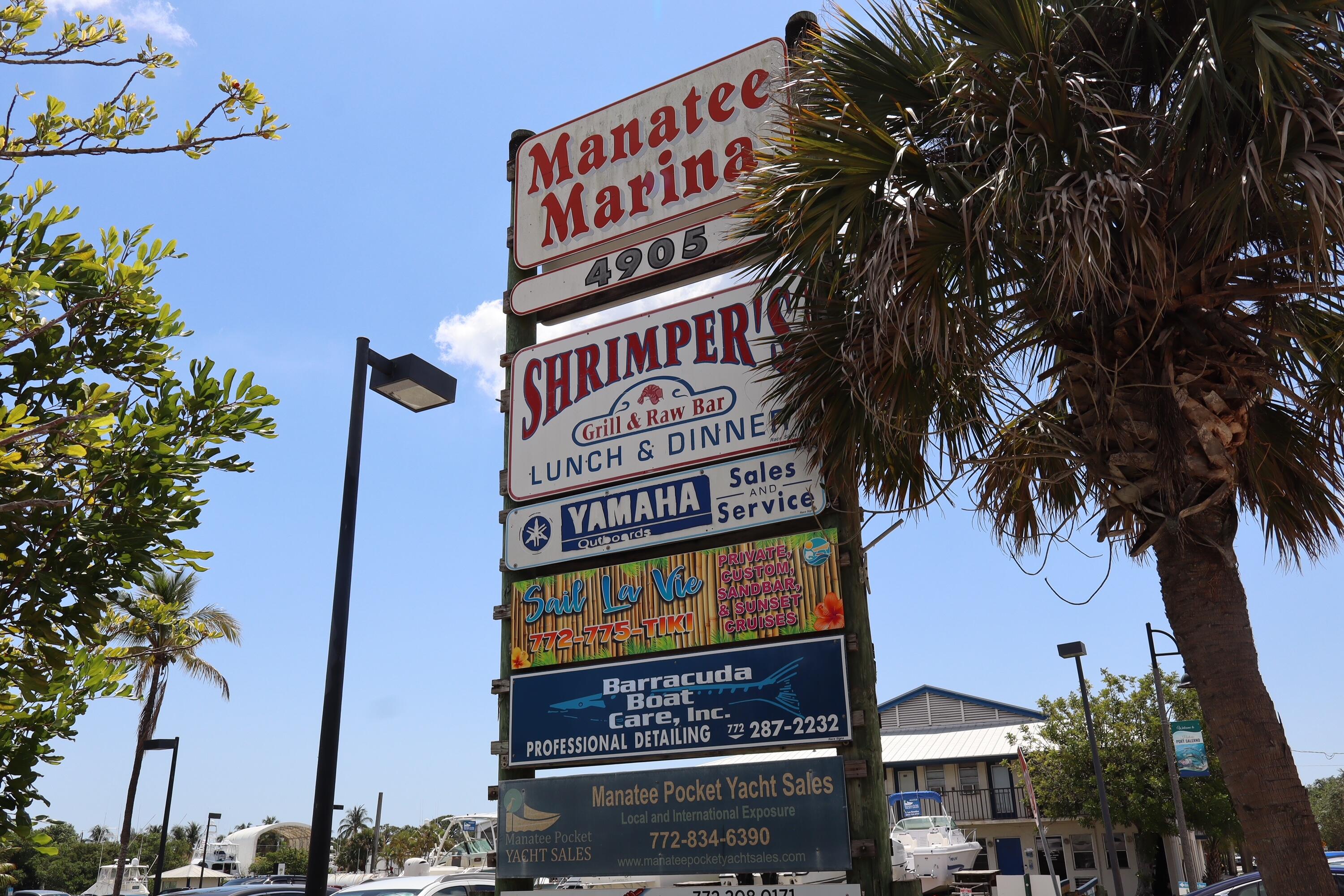4982 Southeast Railway Avenue Stuart, FL 34997 - Photo 27 of 36 a sign that is on a pole