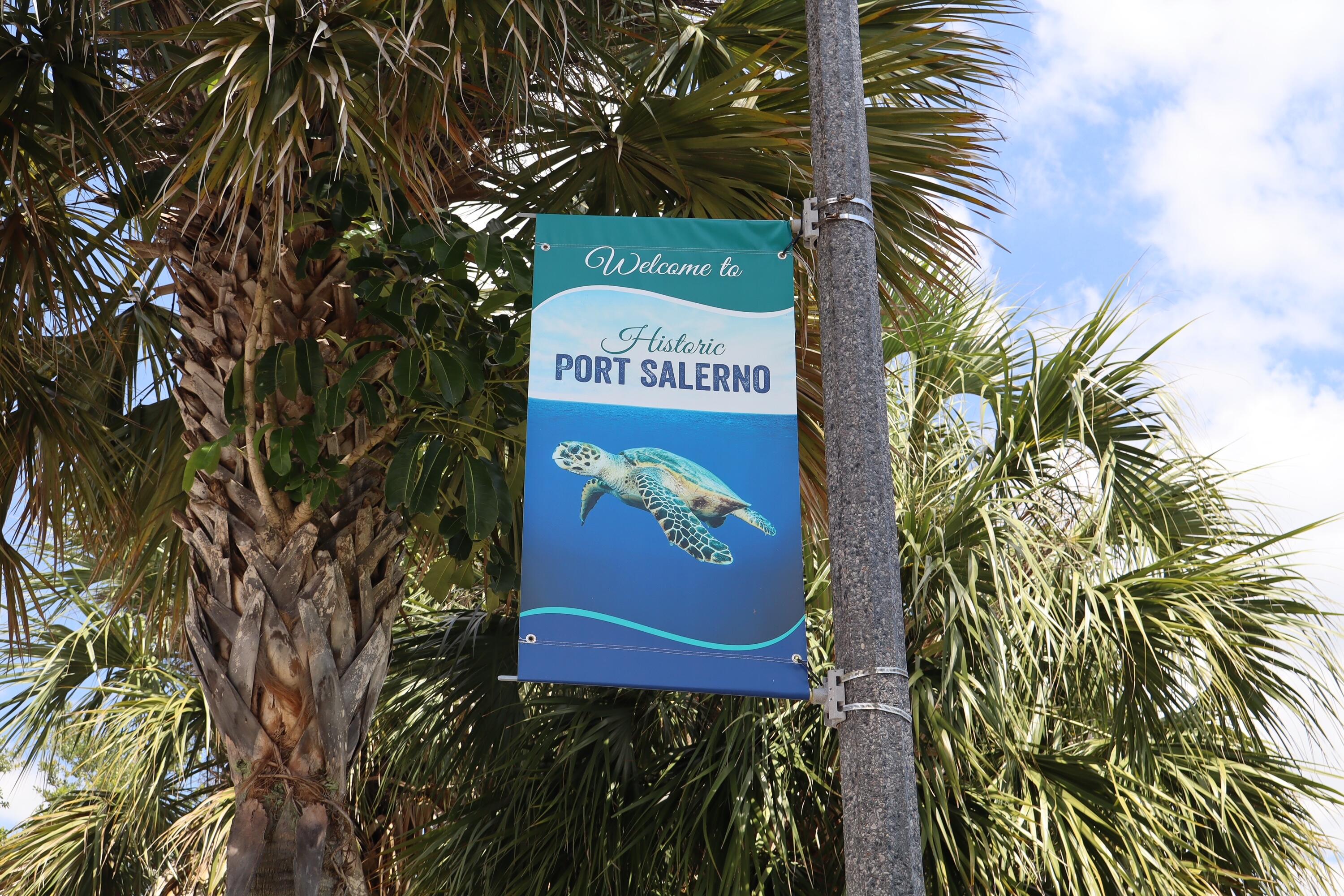 4982 Southeast Railway Avenue Stuart, FL 34997 - Photo 28 of 36 a sign that is on a brick wall