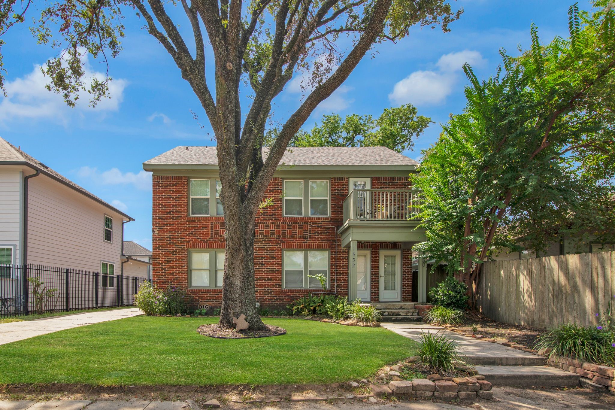 1432 Godwin Street Houston, TX 77023 - Photo 1 of 40 a front view of a house with a yard