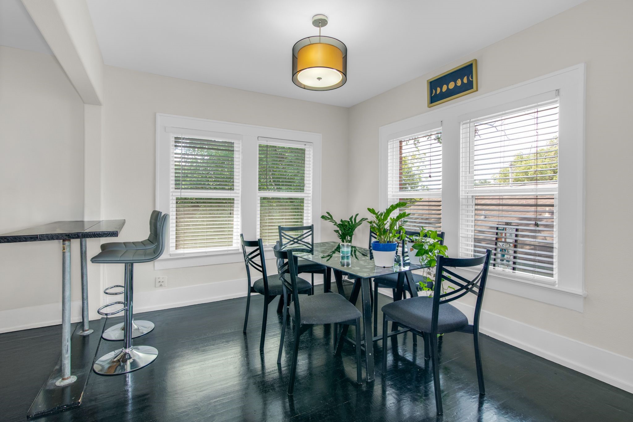 1432 Godwin Street Houston, TX 77023 - Photo 14 of 40 a view of a dining room with furniture and wooden floor