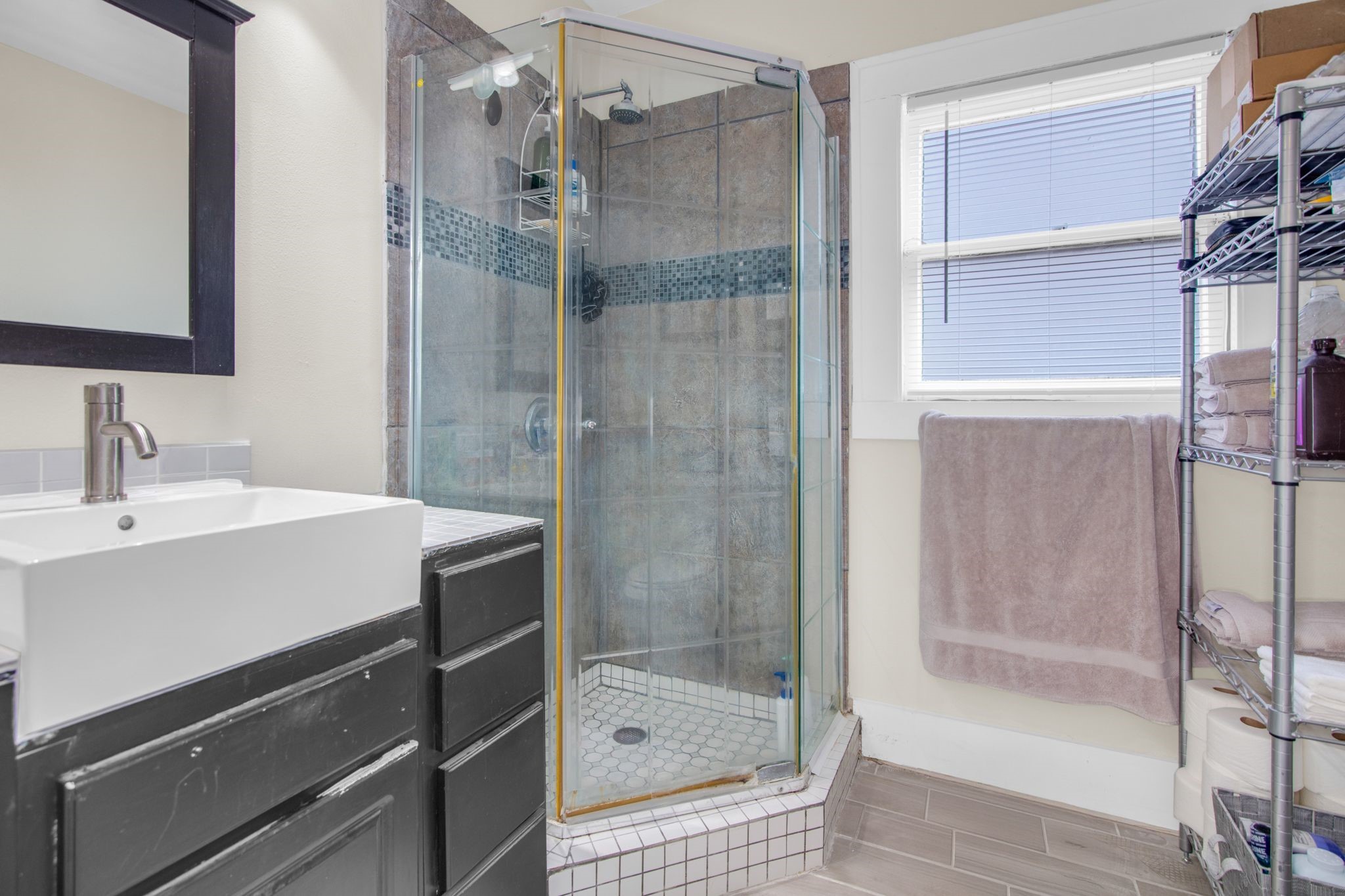 1432 Godwin Street Houston, TX 77023 - Photo 23 of 40 a bathroom with a shower and a sink