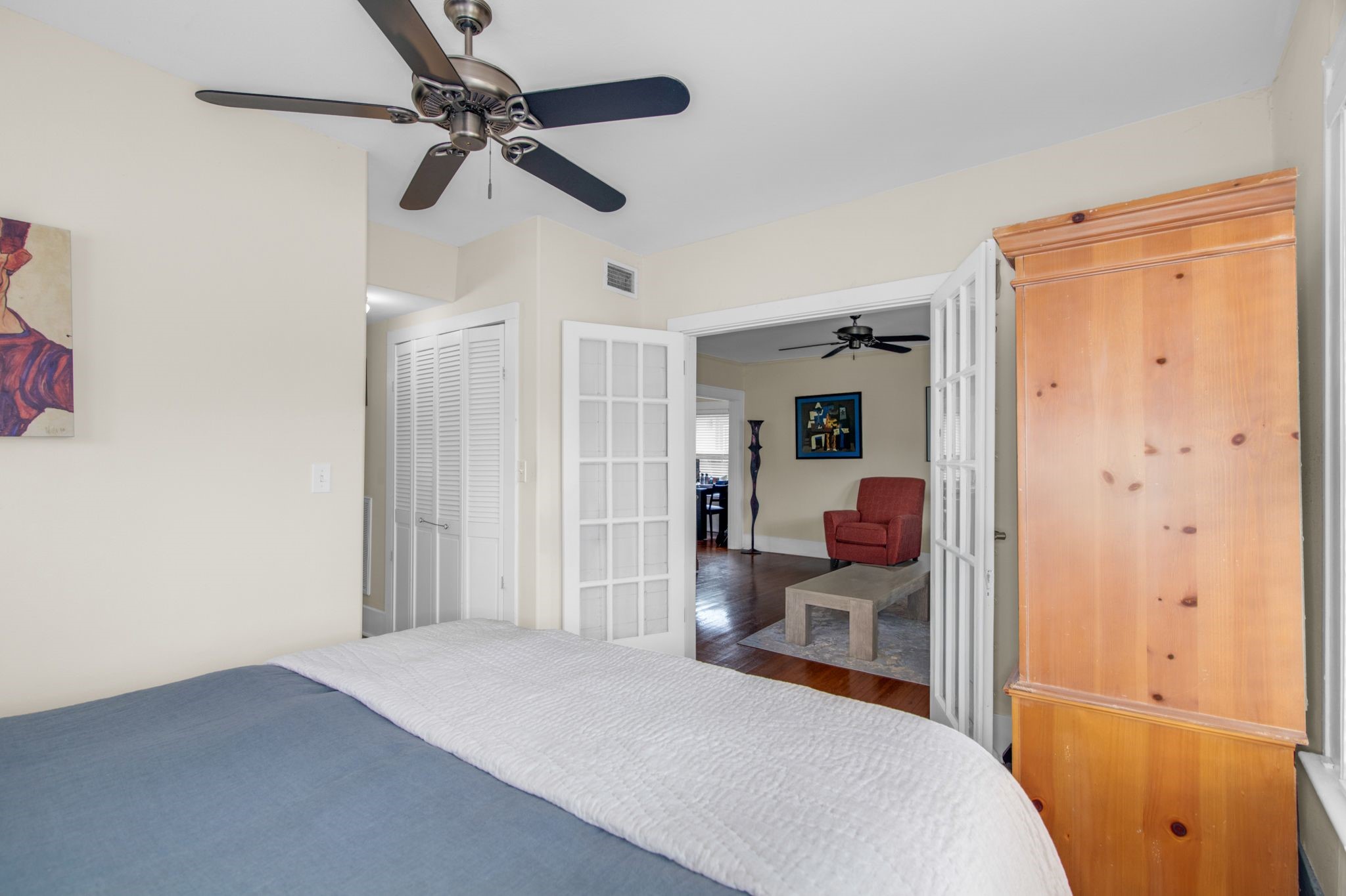 1432 Godwin Street Houston, TX 77023 - Photo 25 of 40 a bedroom with a bed and a walk in closet