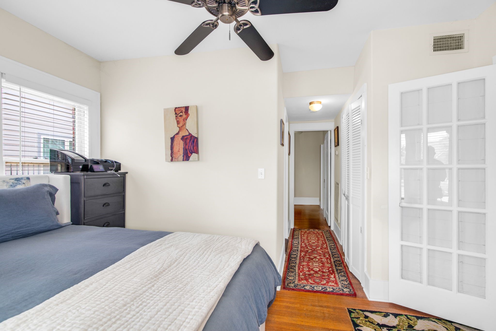 1432 Godwin Street Houston, TX 77023 - Photo 26 of 40 a bedroom with a bed and a window
