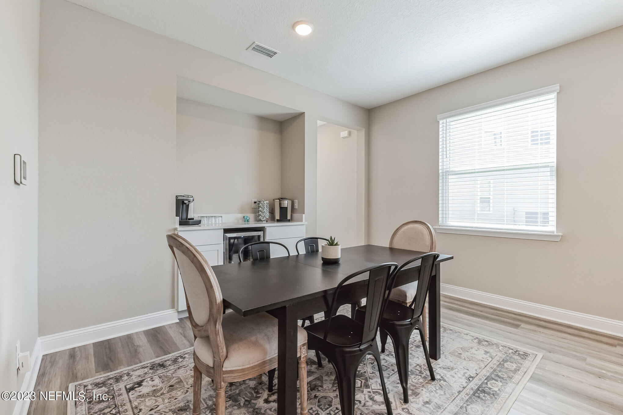 7062 Red Timber Road Jacksonville, FL 32244 - Photo 12 of 31 a view of a dining room with furniture