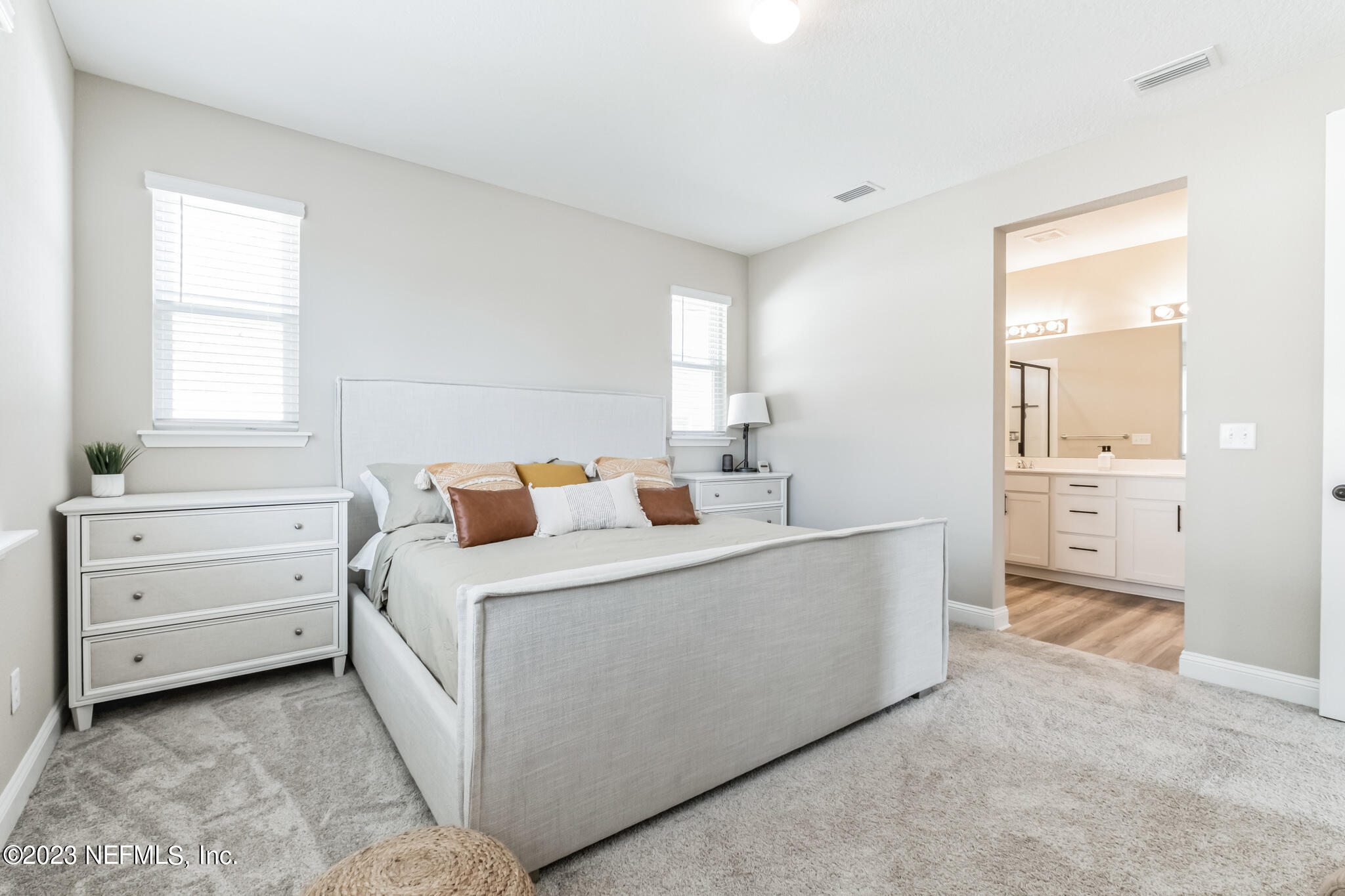 7062 Red Timber Road Jacksonville, FL 32244 - Photo 25 of 31 a room with a bed and a cabinets