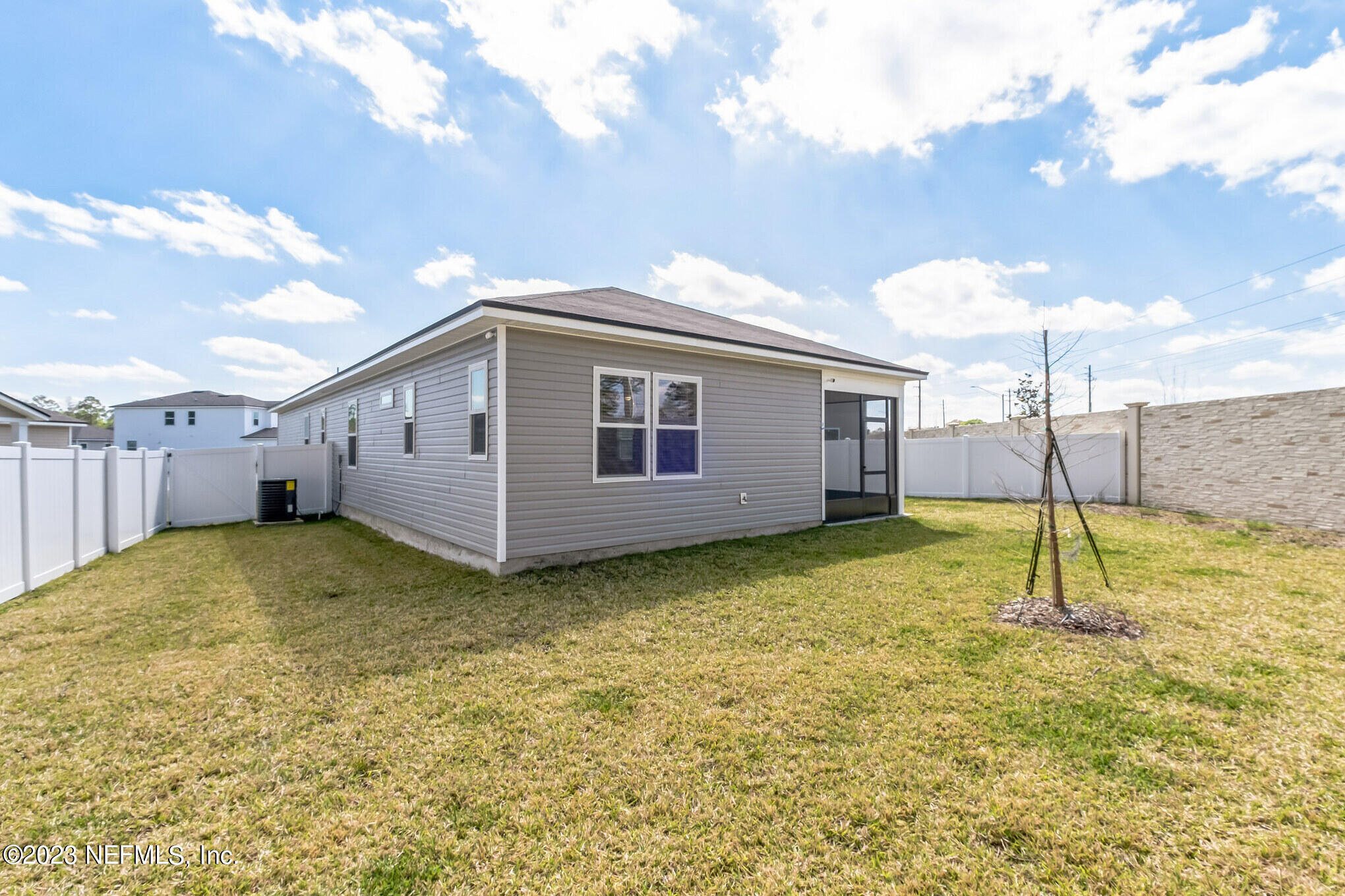 7062 Red Timber Road Jacksonville, FL 32244 - Photo 30 of 31 a view of a house with a backyard