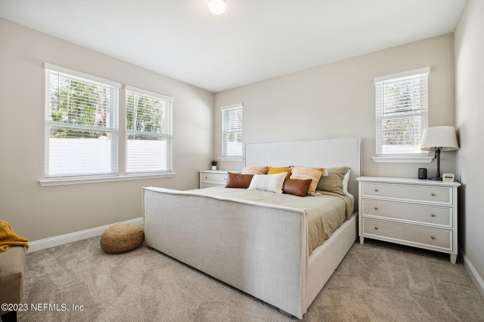 7062 Red Timber Road Jacksonville, FL 32244 - Photo 7 of 31 a bedroom with bed and a window