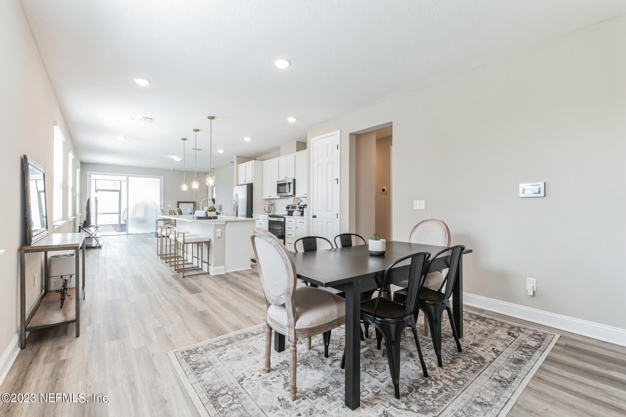 7062 Red Timber Road Jacksonville, FL 32244 - Photo 10 of 31 a view of a dining area with furniture