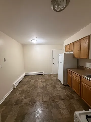 a view of a kitchen with a sink