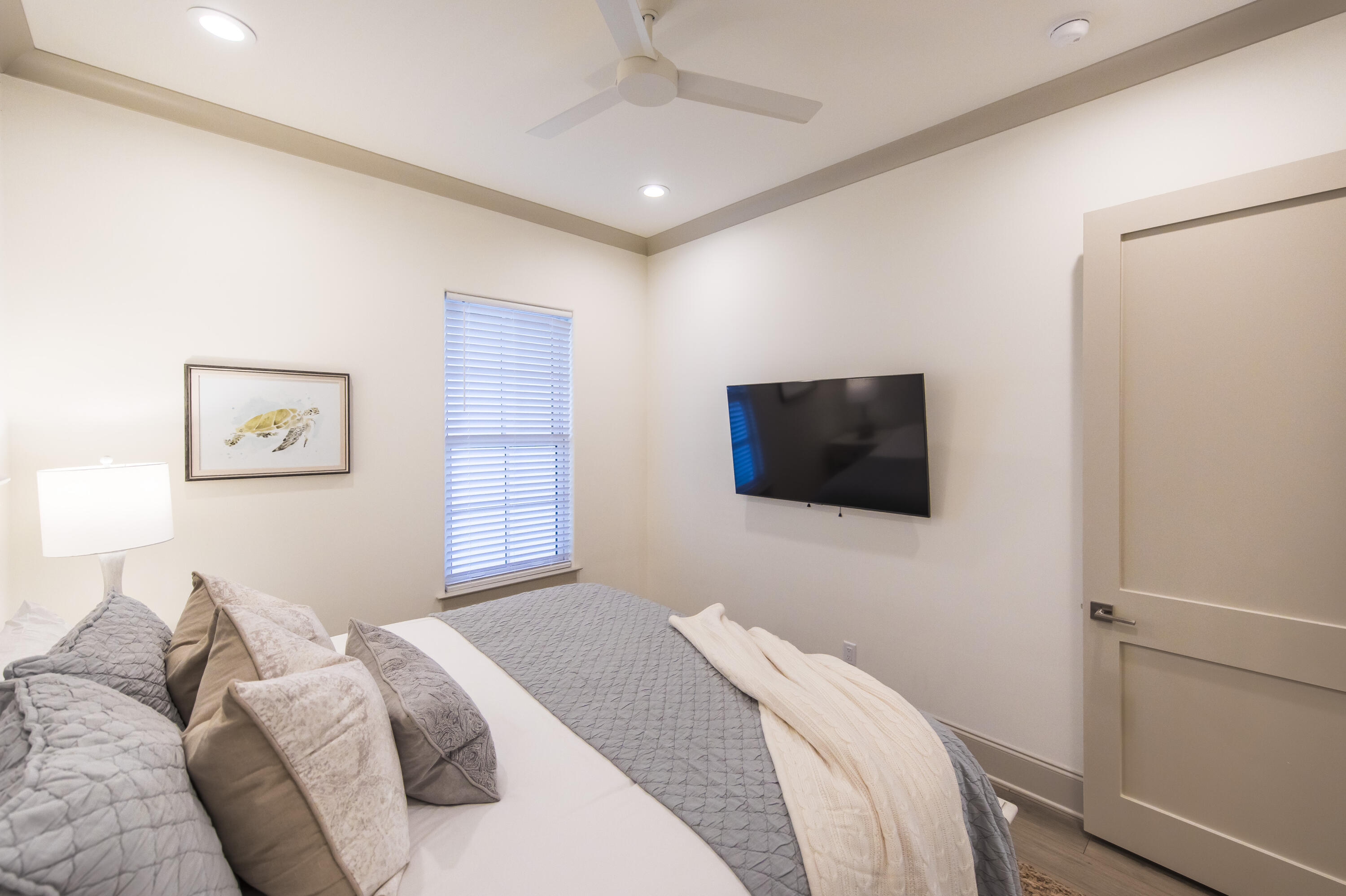70 Marthas Lane, Unit 1201 Santa Rosa Beach, FL 32459 - Photo 13 of 28 a bedroom with a bed and a flat screen tv