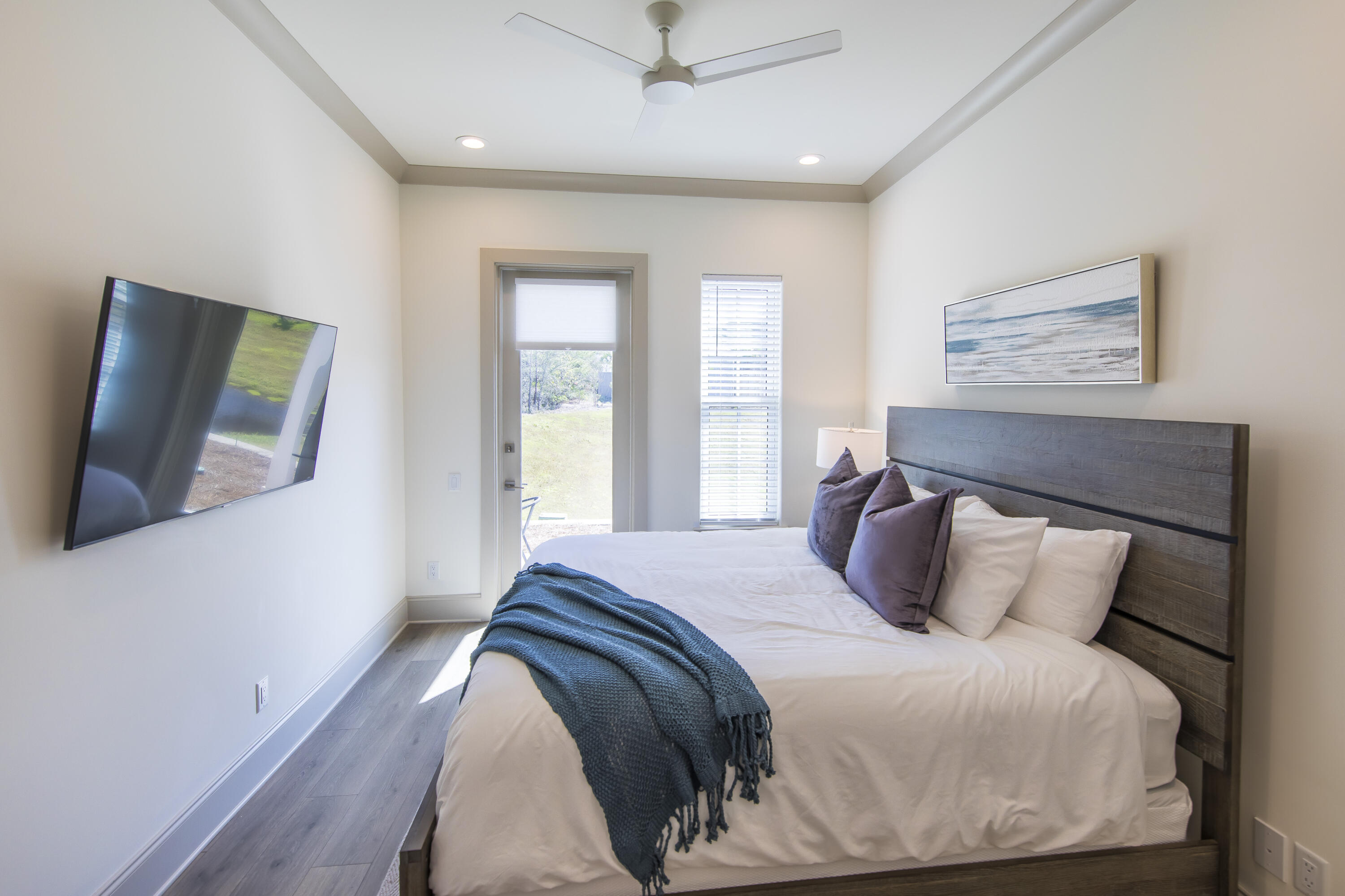 70 Marthas Lane, Unit 1201 Santa Rosa Beach, FL 32459 - Photo 15 of 28 a bedroom with a bed and a flat screen tv