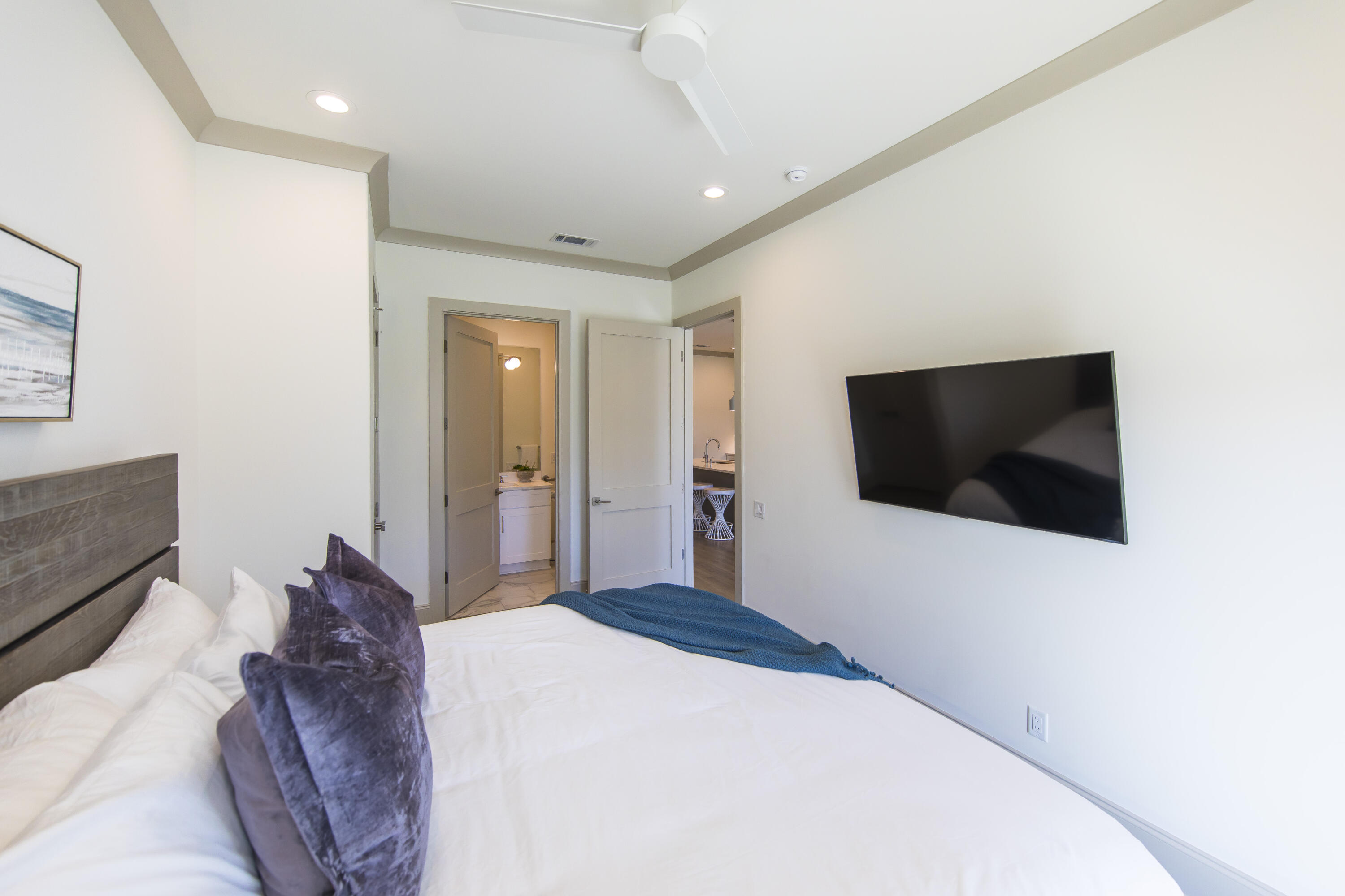 70 Marthas Lane, Unit 1201 Santa Rosa Beach, FL 32459 - Photo 17 of 28 a bedroom with a large bed and a flat screen tv