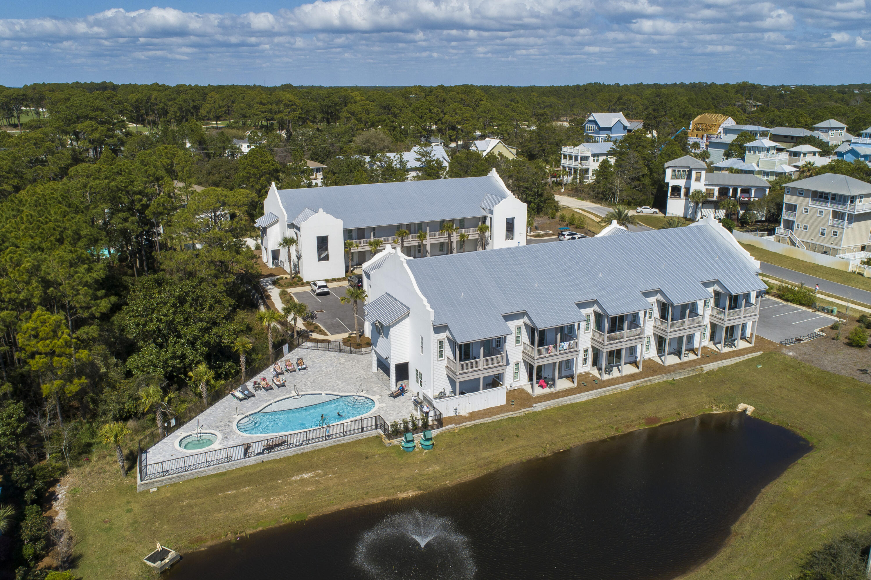 70 Marthas Lane, Unit 1201 Santa Rosa Beach, FL 32459 - Photo 22 of 28 an aerial view of residential houses with outdoor space and trees