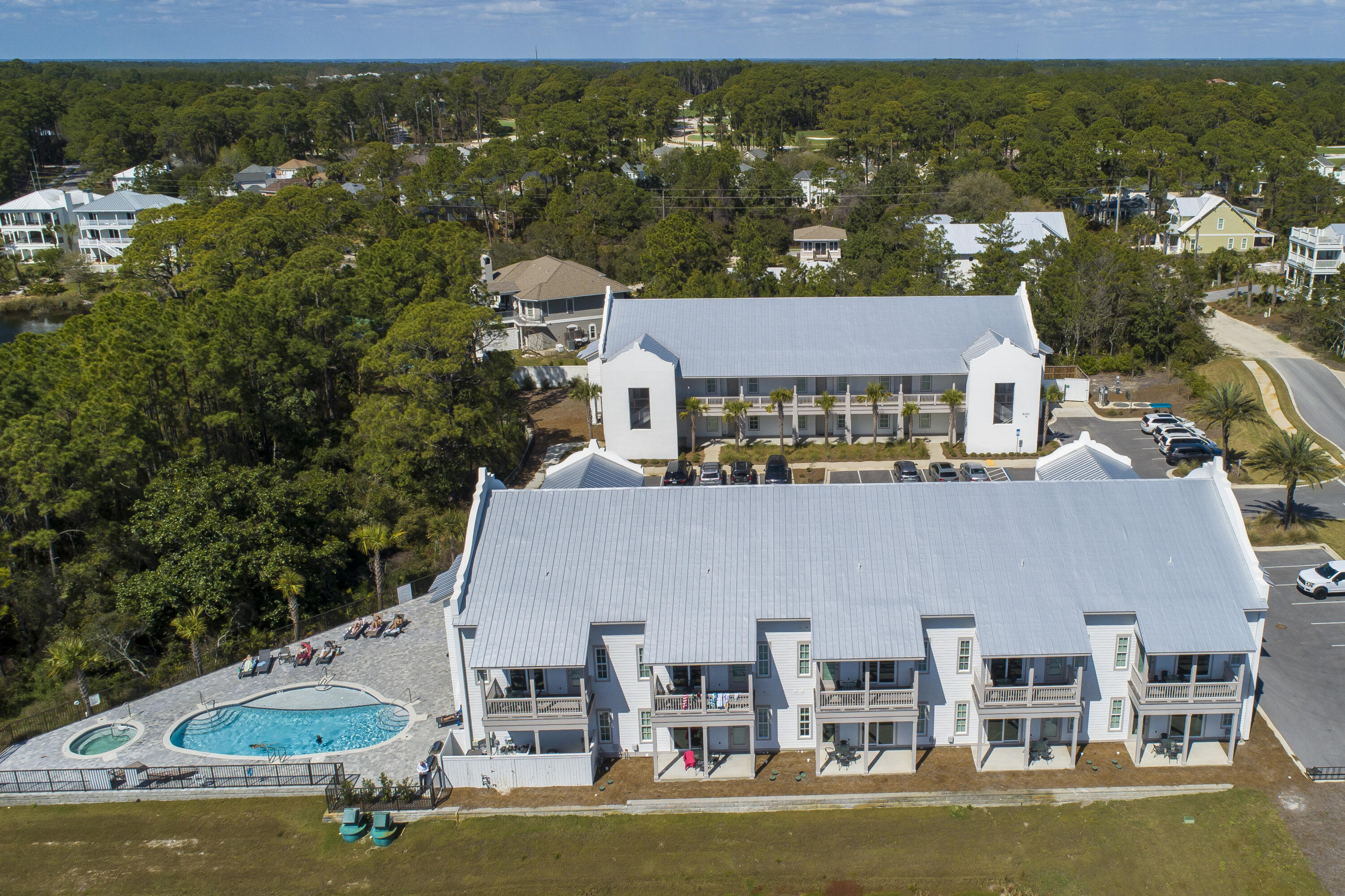 70 Marthas Lane, Unit 1201 Santa Rosa Beach, FL 32459 - Photo 23 of 28 an aerial view of residential houses with outdoor space and swimming pool