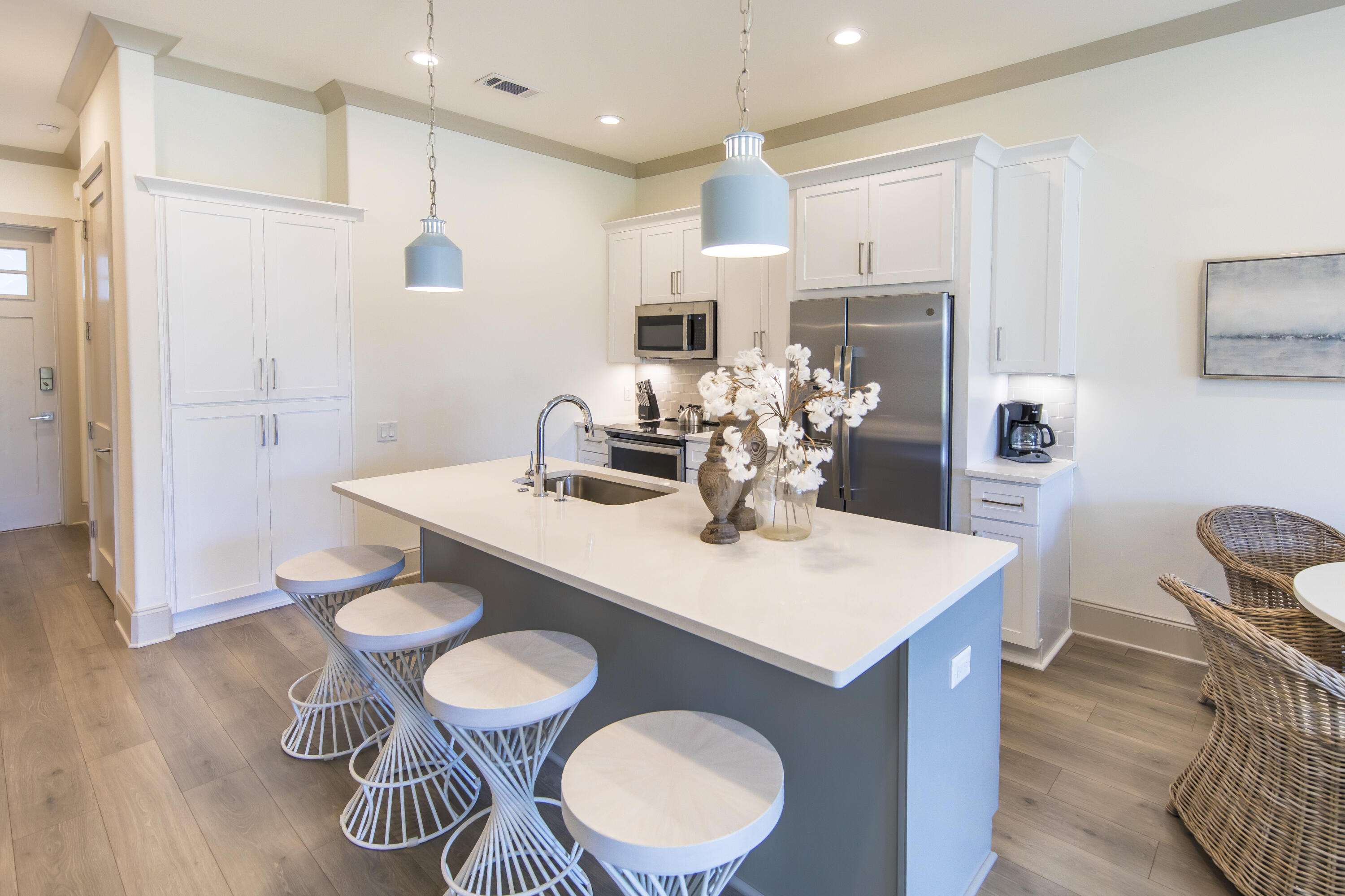 70 Marthas Lane, Unit 1201 Santa Rosa Beach, FL 32459 - Photo 3 of 28 a view of a dining room with furniture and wooden floor