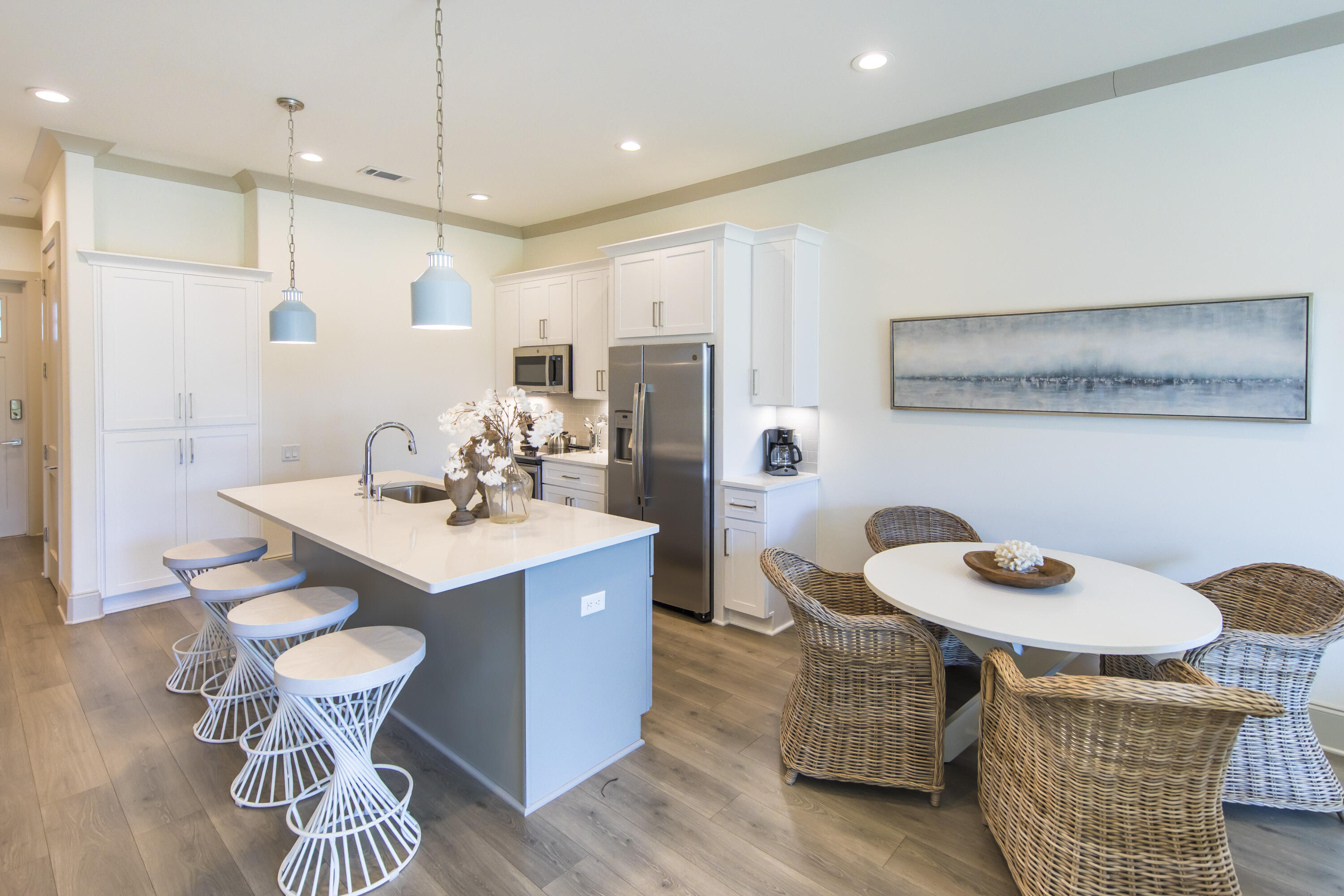 70 Marthas Lane, Unit 1201 Santa Rosa Beach, FL 32459 - Photo 4 of 28 a kitchen with a table and chairs in it