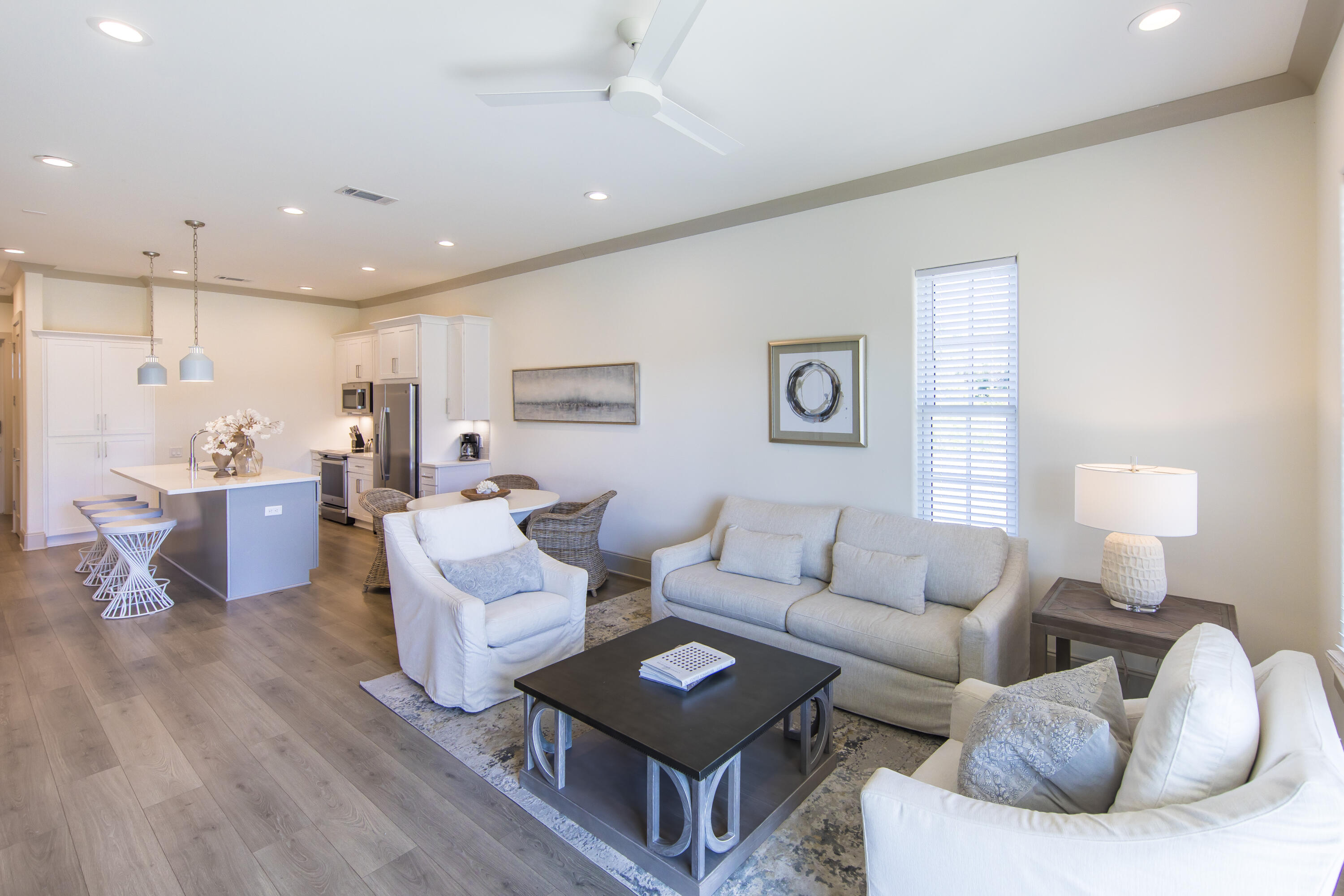 70 Marthas Lane, Unit 1201 Santa Rosa Beach, FL 32459 - Photo 6 of 28 a living room with furniture kitchen view and a table