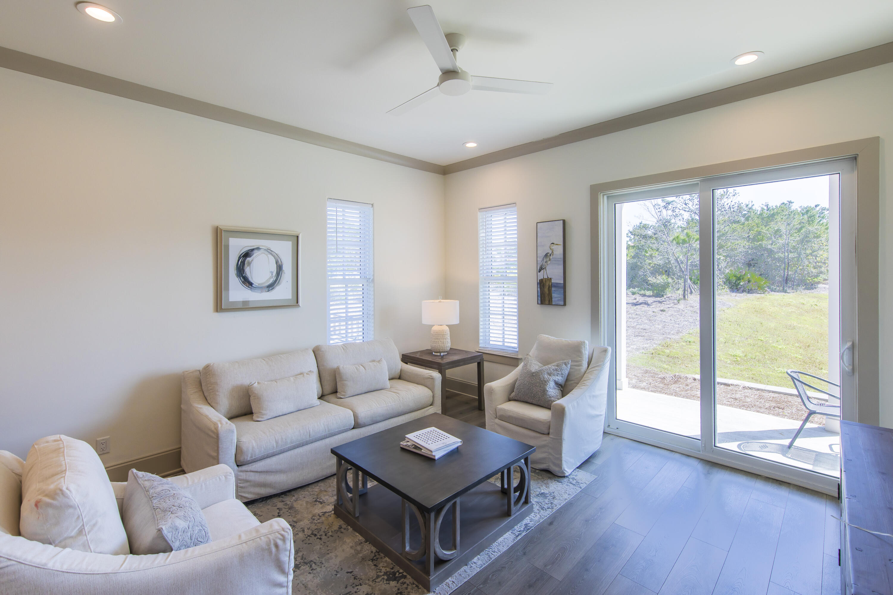 70 Marthas Lane, Unit 1201 Santa Rosa Beach, FL 32459 - Photo 7 of 28 a living room with furniture and a floor to ceiling window