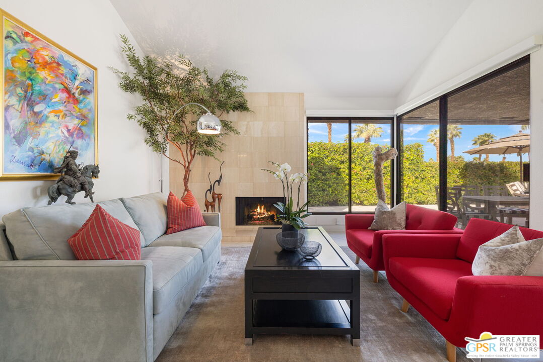 8 Alta Vista Rancho Mirage, CA 92270 - Photo 20 of 46 a living room with furniture and a large window