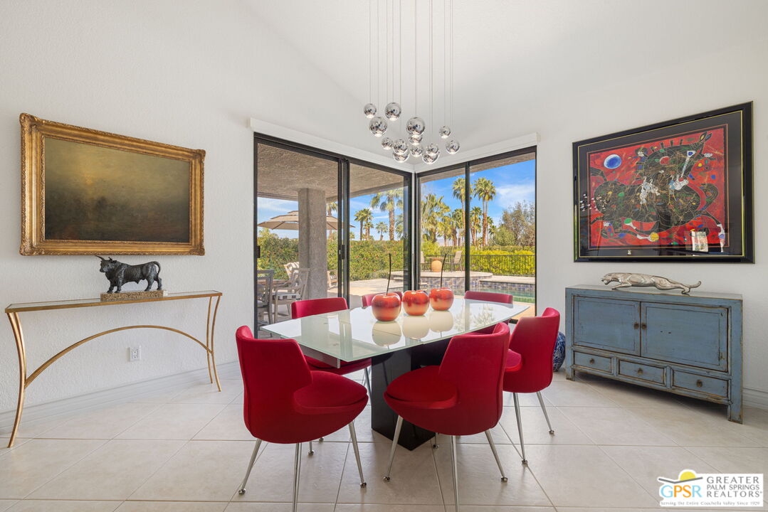 8 Alta Vista Rancho Mirage, CA 92270 - Photo 21 of 46 a living room with furniture and a flat screen tv
