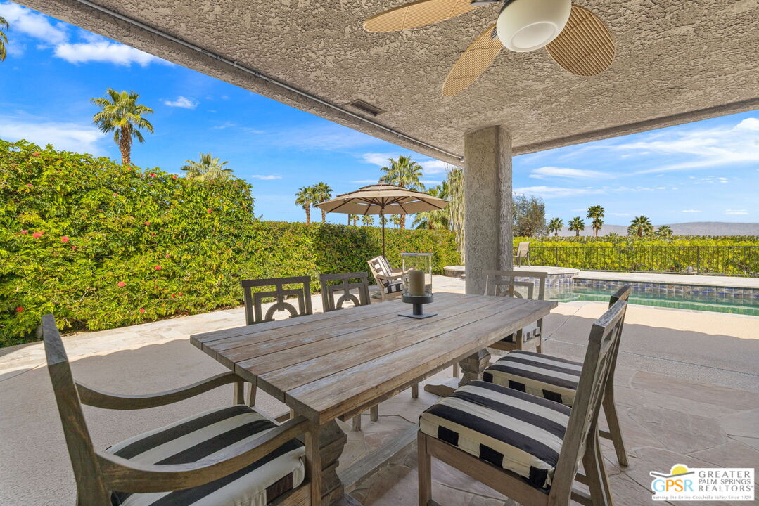8 Alta Vista Rancho Mirage, CA 92270 - Photo 22 of 46 a view of a patio with a table