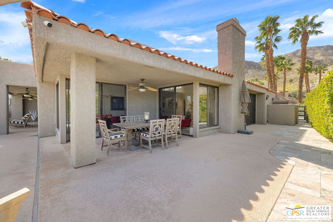 8 Alta Vista Rancho Mirage, CA 92270 - Photo 23 of 46 a view of a patio with table and chairs